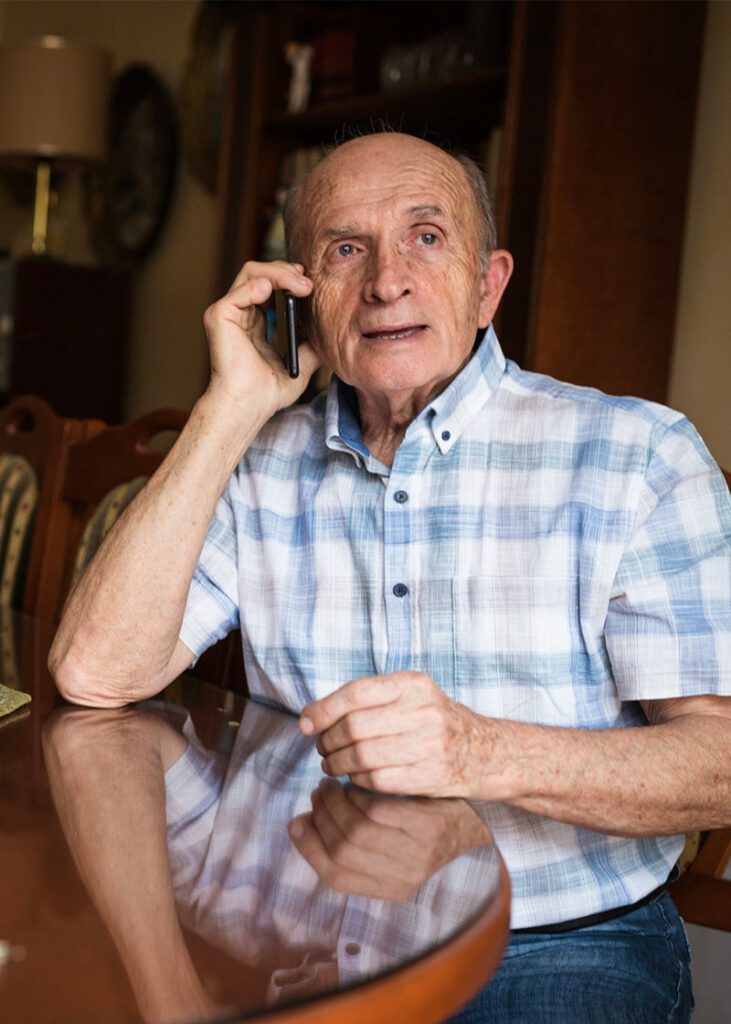 elderly man on the phone